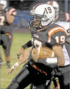  ?? Photo by Jackie Schear/ Trentonian ?? Pennsbury quarterbac­k Breon Clark rushed for a pair of touchdowns in last Friday’s win over Council Rock North.