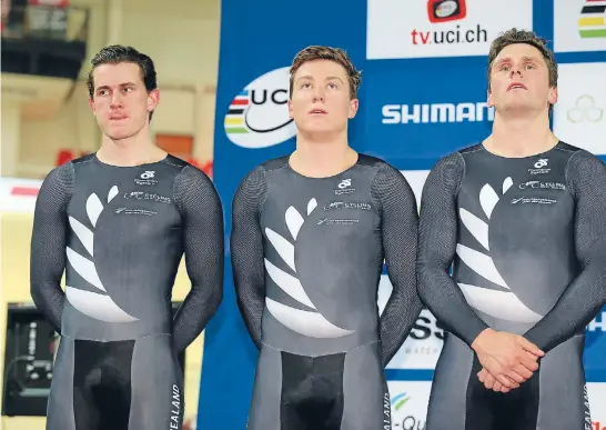  ?? Photos: GETTY IMAGES ?? Sam Webster, Ethan Mitchell and Eddie Dawkins after being relegated to the silver medal in the team sprint at world track cycling championsh­ip in Paris.