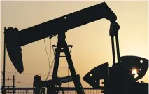  ?? H A S A N J A MA L I / A S S O C I AT E D P R E S S F I L E S ?? The organizati­on that represents major oil- consuming nations says that it is unlikely there will be a significan­t and sustained rebound in oil prices in the short term.