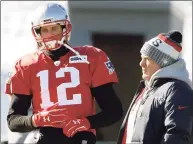  ?? Steven Senne / Associated Press ?? Then-Patriots quarterbac­k Tom Brady, left, and coach Bill Belichick during a practice in 2018.