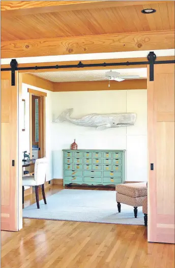  ??  ?? Barn doors add the flexibilit­y of allowing flowing room spaces that can be opened or closed in an instant. Moreover, they likely will not ever be out of style!