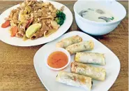  ?? KRISTEN COX ROBY/FOR THE NEW MEXICAN ?? Tom kha soup, spring rolls and pad see ew from Bo’s Authentic Thai, a food truck at 502 Old Santa Fe Trail, across from the Capitol.