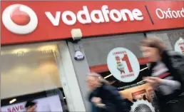  ??  ?? A Vodafone store in London. Vodafone announced on Monday that it has merged with India’s third-largest network, Idea Cellular, to create the country’s largest mobile operator, in a process that is expected to take 18 to 20 months to complete.