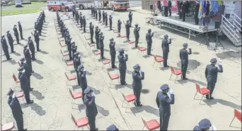  ?? PHOTO COURTESY PHILADELPH­IA FIRE DEPARTMENT ?? Recruits at attention at graduation.