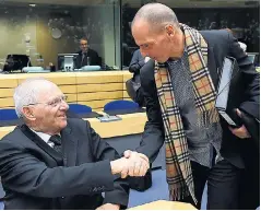  ??  ?? Yanis Varoufakis greets German finance minister Wolfgang Schäuble in Brussels