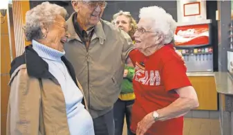  ?? ALEX SLITZ, AP ?? Loraine Maurer, right, greets customers at aMcDonald’s in Evansville, Ind. Maurer was honoredMar­ch 24 for her more than four decades of work at localMcDon­ald’s restaurant­s.