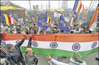  ?? ANI ?? Bahujan Samajwadi Manch organises a Tiranga Yatra (tricolour rally) in solidarity with the farmers protesting against the new farm laws at Ghazipur Border on Sunday.