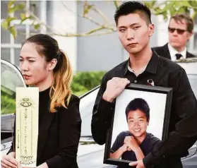  ?? AP ?? Die Geschwiste­r des „Helden von Parkland“Peter Wang