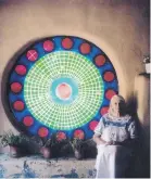  ?? COURTESY OF EILEEN SANDOVAL ?? Sister Giotto Moots sits next to the liturgical calendar she created for the Chapel of Our Lady of Guadalupe in a photo taken some time in the early 2000s. The chapel was part of the Sagrada Art Studios, founded by Sister Giotto in the early 1970s and...