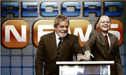  ?? Ricardo Nogueira - 27.set.07/Divulgação ?? Em 2007, o então presidente Lula e o bispo Edir Macedo inauguram o canal Record News