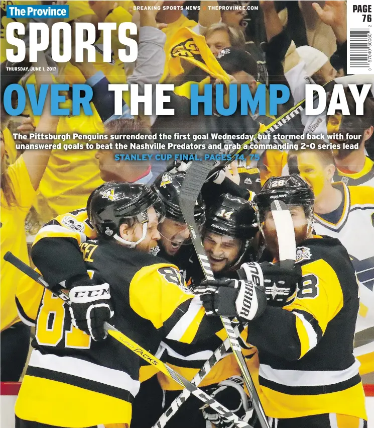  ?? — GETTY IMAGES ?? Evgeni Malkin of the Pittsburgh Penguins, second from left, celebrates after scoring on Wednesday in Game 2 of the Stanley Cup final in Pittsburgh, Pa.