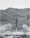  ?? KCNA via KNS ?? Hwasong-14 interconti­nental ballistic missile.