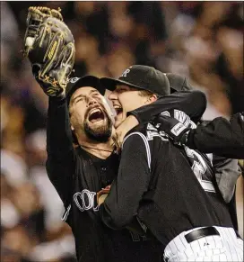  ?? ASSOCIATED PRESS 2007 ?? “It was the hardest thing I’ve ever done in my life,” former Rockies first baseman Todd Helton (left) said of walking away from the game. “I’ve been a baseball player since I could walk, always knew I was going to be a baseball player.”