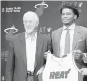  ?? HECTOR GABINO/EL NUEVO HERALD ?? Pat Riley, left, turned down a package of draft picks from the Boston Celtics for the Heat’s first-round draft pick this year. The Heat used the pick to select Duke forward Justice Winslow, right.