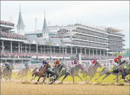 ?? Julio Cortez The Associated Press ?? Horses round the first turn during the 149th running of the Kentucky Derby at Churchill Downs in 2023.