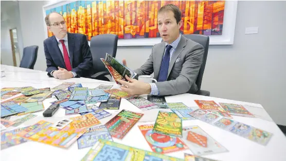  ?? TREVOR HAGAN/ BLOOMBERG ?? Pollard Banknote Ltd. chief executive officers Doug Pollard, right, and John Pollard have found their luck in the scratch-and-win business, the fastest growing part of North American lotteries. Their company has evolved from a general printer to the...