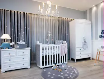  ?? ?? BABY’S DAY IN
The Heirloom nursery space is a neutral, elegant, dreamy and stylish baby nursery themed room, done up in a muted grey aesthetic that shines a soft