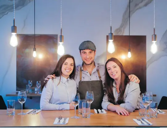  ?? PHOTOS: ALLEN MCINNIS ?? Partners Nathalie Côté, left, Alessandro Bleve and Sara Belley in the 50-seat Stella Pizzeria on Laurier Ave. E.