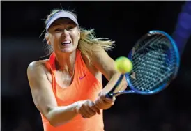  ?? — AP ?? Maria Sharapova returns to Roberta Vinci in Stuttgart on Wednesday.