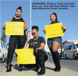  ??  ?? UNASHAMED: Posing in King’s Alexandra Road, are, from left, Bulie Mahola, Zuko Gugu Silwana and Liyema Sotenjwa