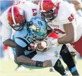  ?? ETHAN HYMAN/TNS ?? Pharoah McKever, left, played one year at defensive end for North Carolina State before switching to tight end. As a graduate transfer, he will be playing that position with FIU this fall.