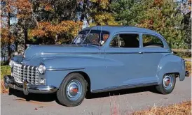  ?? Motor Matters photos ?? This 1948 Dodge Deluxe two-door sedan, one of 81,399 built, left the factory on October 5, 1948, on its way to a dealership in Lincoln, Nebraska, where it was purchased by Bob Vaughn’s grandfathe­r, George Freeman. Its window sticker base price was...