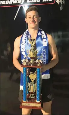  ?? Photo / Supplied ?? National saloon champion Cam Roigard with his trophy and (below) his Chevrolet 355ci powered car.