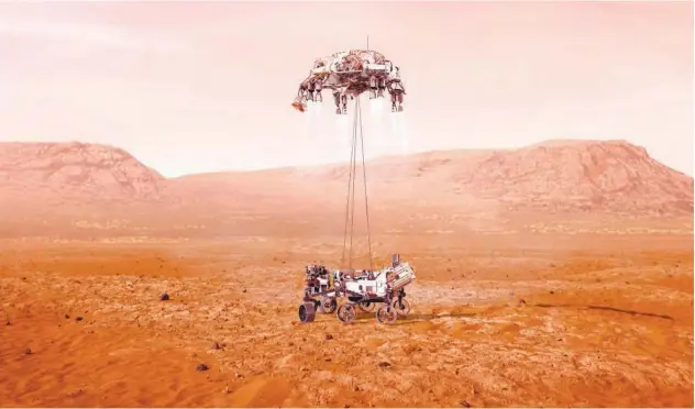  ?? Associated Press ?? ↑
An illustrati­on provided by Nasa shows the Perseveran­ce rover (bottom) landing on Mars.