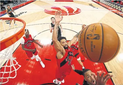  ?? SCOTT AUDETTE GETTY IMAGES ?? Khem Birch had 14 points, six rebounds and two blocks in 29 minutes of the Raptors’ win over San Antonio.