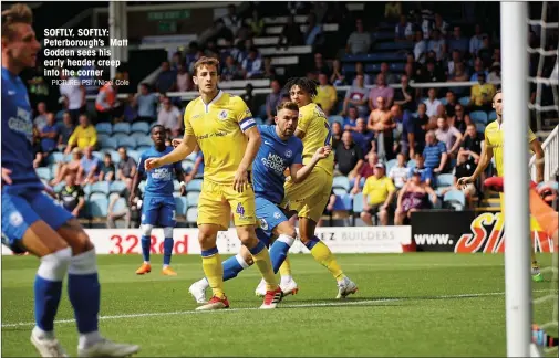  ?? PICTURE: PSI / Nigel Cole ?? SOFTLY, SOFTLY: Peterborou­gh’s Matt Godden sees his early header creep into the corner