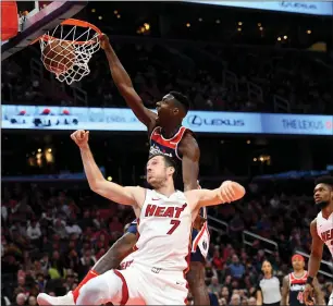  ?? File photo ?? Goran Dragic (7) and the defending Eastern Conference champion Miami Heat come into the season as underdogs to return to the NBA Finals.