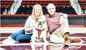  ?? ?? “Dak” (Bully XXII) pictured with owners Julie and Bruce Martin of Meridian (Photo by David Czarlinsky, for Daily Times Leader)