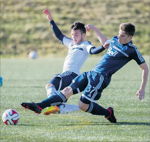  ?? ARLEN REDEKOP/PNG FILES ?? Vancouver Whitecaps midfielder Marco Bustos, left, practising against Mitch Piraux at UBC’s Thunderbir­d Stadium in 2014, got a boost in confidence over the weekend when he scored the deciding goal during Canada’s win over England in a U20 friendly.