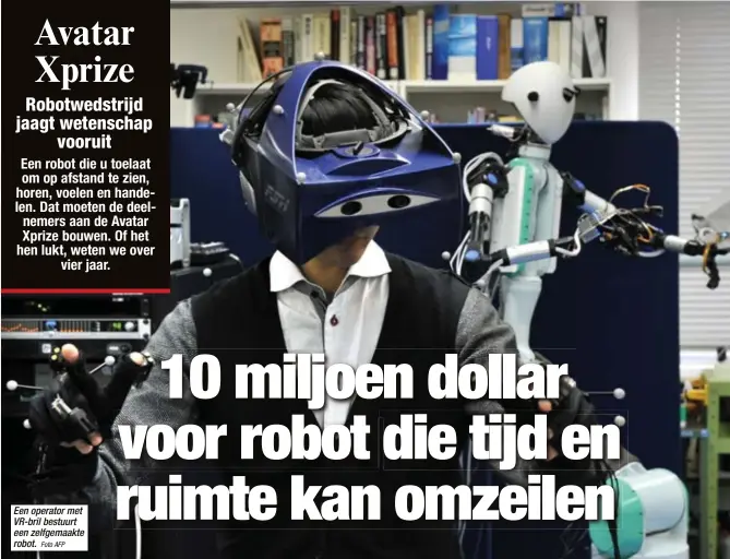  ?? Foto AFP ?? Een operator met VR-bril bestuurt een zelfgemaak­te robot.