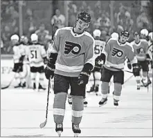  ?? [DERIK HAMILTON/THE ASSOCIATED PRESS] ?? The Philadelph­ia Flyers’ Ivan Provorov skates off the ice after a loss to the Boston Bruins on Saturday in Philadelph­ia. The Bruins won 3-0.