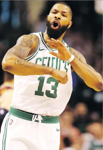  ?? GETTY IMAGES ?? Boston’s Marcus Morris celebrates after hitting a basket against the visiting Cavaliers during the first quarter on Sunday at TD Garden. The Celtics scorched the Cavs 108-83.