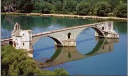  ?? (Rick Steves’ Europe) ?? Built in the
12th century, the St. Benezet Bridge lasted until 1668 when a devastatin­g flood took out most of the half-mile-long span. Tourists can pay to walk out on the bridge for a sweeping view of Avignon.