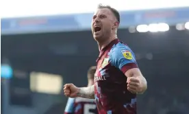 ?? ?? Ashley Barnes celebrates as Burnley run away with the east Lancs derby in the second half. Photograph: James Gill/Danehouse/Getty Images