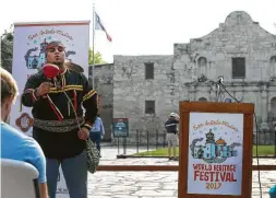  ?? John Davenport / Staff photograph­er ?? Ramón Vásquez IV, with American Indians in Texas at the Spanish Colonial Missions performs during a 2017 event opening the second Annual World Heritage Festival. The group is locked in a dispute with the city and Texas General Land Office over a cemetery designatio­n and a protocol for handling of any human remains.