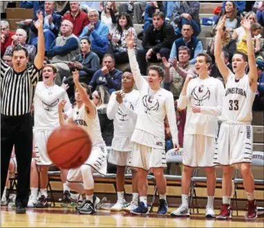  ?? PETE BANNAN — DIGITAL FIRST MEDIA ?? Conestoga’s bench reacts to a Pioneer three-pointer in the second half Friday at Conestoga. The Pioneers beat Penncrest, 53-47.