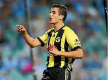  ?? PHOTO: GETTY IMAGES ?? Wellington Phoenix striker Andrija Kaluderovi­c sends a message home to Serbia via the TV cameras after scoring his first goal for the team.