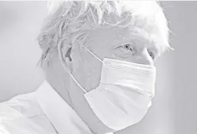  ?? Gareth Fuller/pool Photo via ap ?? Britain’s Prime Minister Boris Johnson looks on during a visit to the Kent Oncology Centre at Maidstone Hospital in Maidstone, Kent, England on February 7.