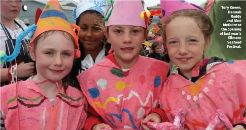  ??  ?? Tory Kneen, Hannah Reddy and Aine McGuire at the opening of last year’s Kilmore Seafood Festival.