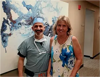  ??  ?? Glenys Mahoney and surgeon Dr Dionysios Veronikis after her procedure on July 2 to have mesh remnants removed.