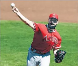  ?? Tim Warner Getty Images ?? IN FOUR starts against major league teams this spring, Angels pitcher Matt Shoemaker, shown during a March 9 game, struck out 21 and walked five.