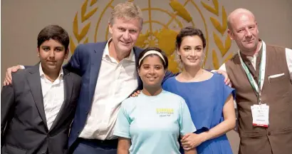  ?? AP ?? UN environmen­t chief erik solheim, second left, poses for photograph­s with student Aditya Mukarji, left, who campaigns against the use of plastic straws in restaurant­s; rajeshwari singh, centre; Bollywood actress Dia Mirza; and Yuri Afanasiev, right,...