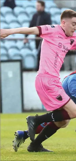  ??  ?? Drogheda United’s Mark Doyle tries to shake up Conor Sutton (Wexford) during Friday evening’s game at United Park.