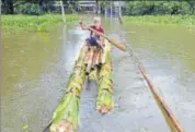  ?? REUTERS FILE ?? Floods have wreaked havoc in 29 of Assam’s 32 districts this month and claimed 77 lives so far.