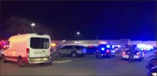  ?? Associated Press ?? In this image from video, police respond to the scene of a fatal shooting at a Walmart on Tuesday night in Chesapeake, Va.