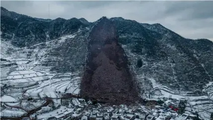  ?? XINHUA PHOTO ?? SHOCKING SIGHT
An aerial view of the deadly landslide in Liangshui village, Tangfang town, city of Zhaotong, Yunnan province, southweste­rn China, on Monday, Jan. 22, 2024.